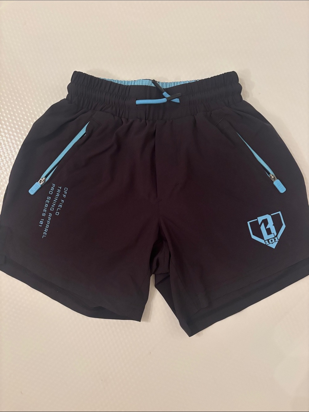 Kids Baseball Lifestyle 101 Black Athletic Shorts with Light Blue Accents
